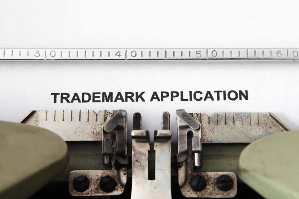 A trademark application is in a typewriter