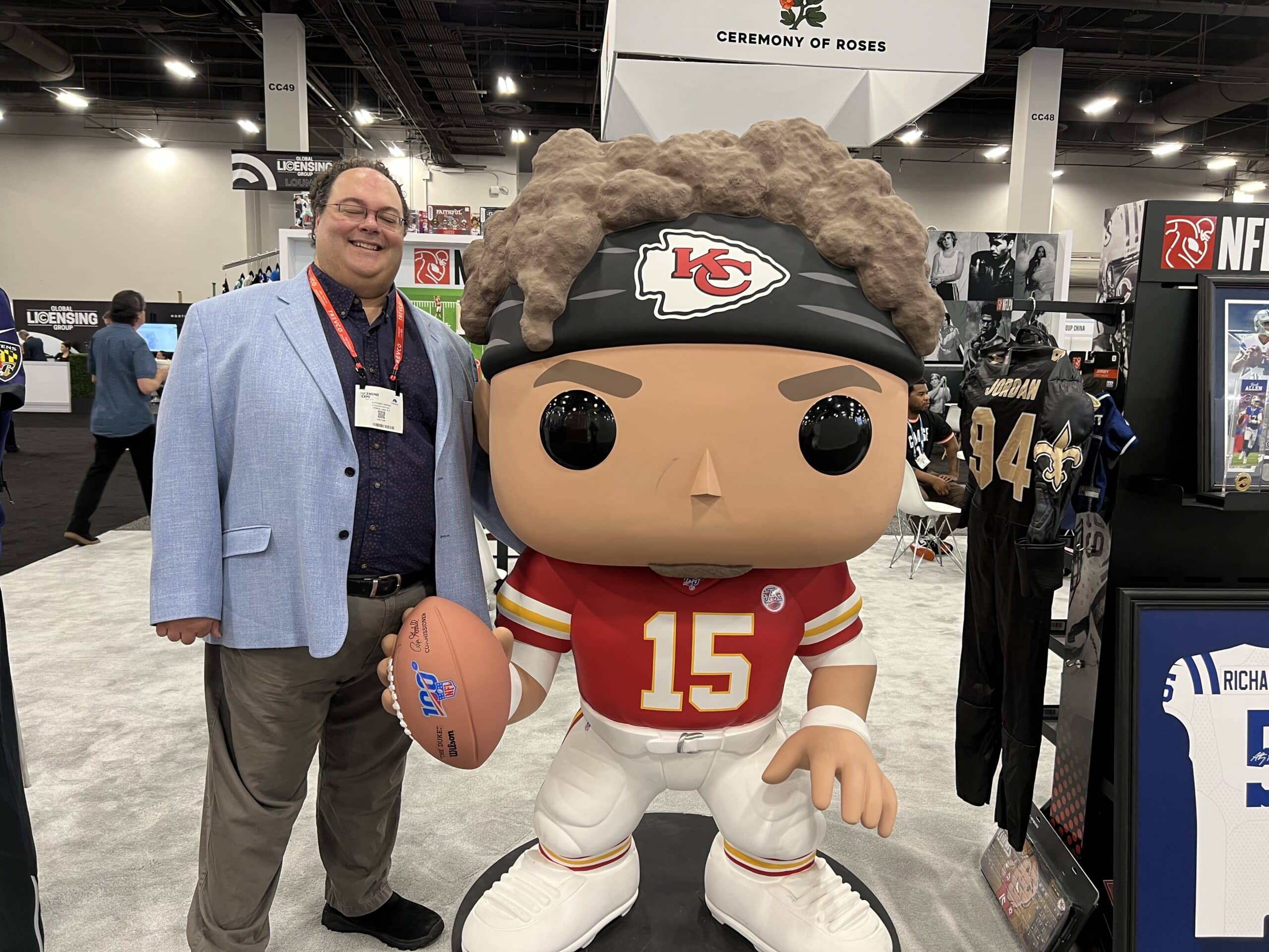 Anthony Verna with a giant Funko Pop of Patrick Mahomes at the International Licensing Expo 2023